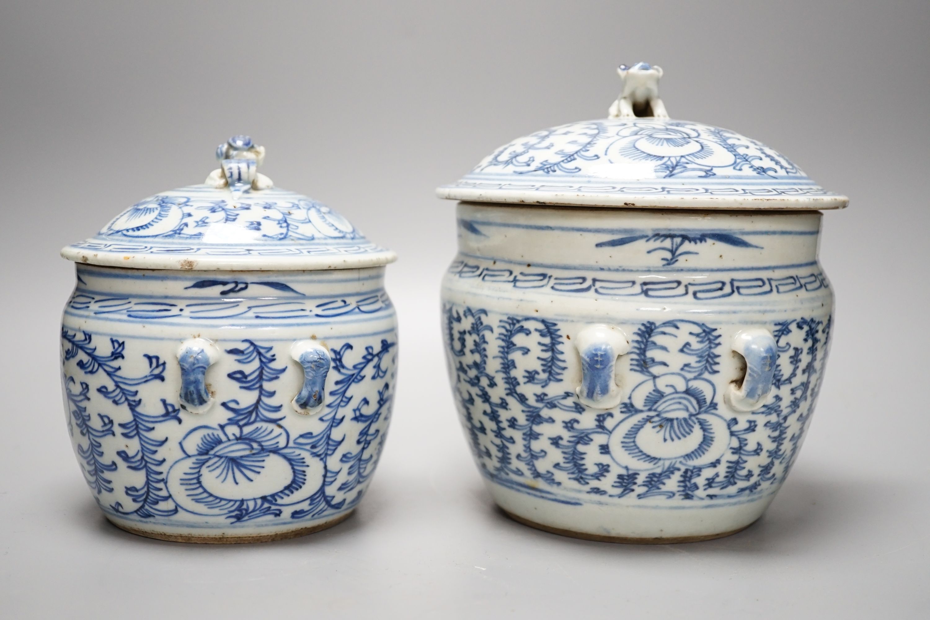 Two Chinese blue and white jars and covers - tallest 20cm high